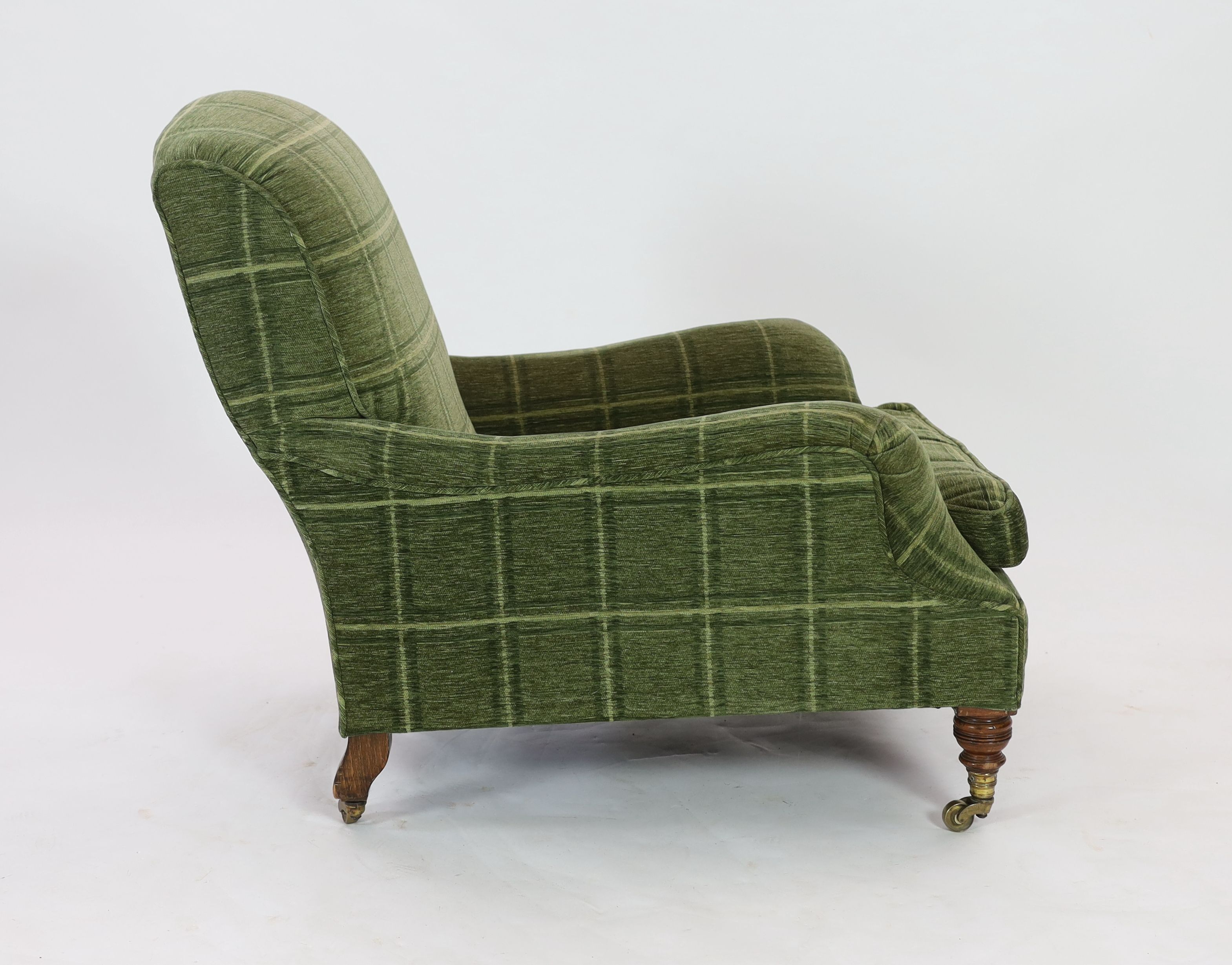 A Victorian Howard & Sons oak framed club armchair, W.78cm D.100cm H.88cm